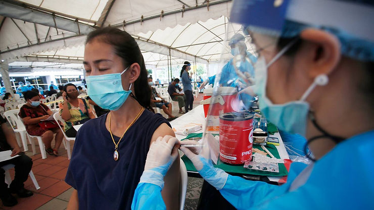 A health worker administers the Sinovac Covid-19 vaccine to a resident of the Klong Toey area of Bangkok in Thailand, a neighborhood that has seen a spike in coronavirus cases. Photo / AP